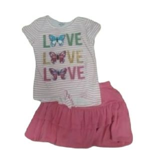 Girls size 10 shirt with matching skirt.